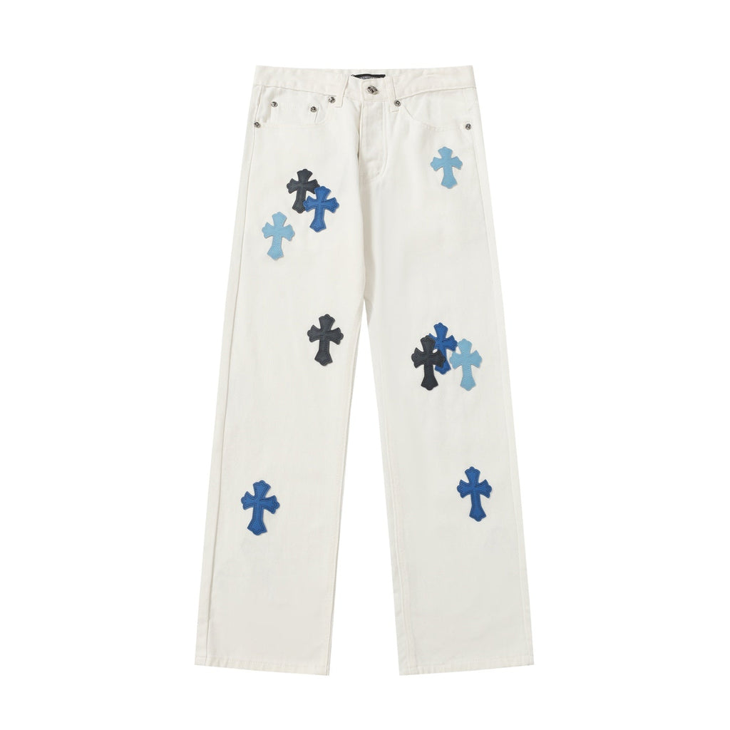 Chrome Hearts' classic white denim jeans with a colored leather cross wash.