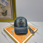 Chrome Hearts denim washed and distressed baseball cap.