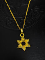 A full-diamond six-pointed star pendant necklace from Chrome Hearts.