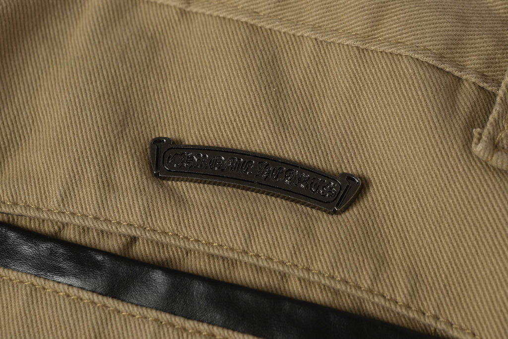 Chrome Hearts khaki straight-leg pants with colorful leather cross patch