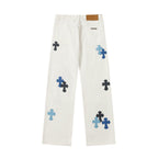 Chrome Hearts' classic white denim jeans with a colored leather cross wash.