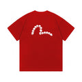 The T-shirt is an EVISU short-sleeve tee featuring a skull and large "M" print.