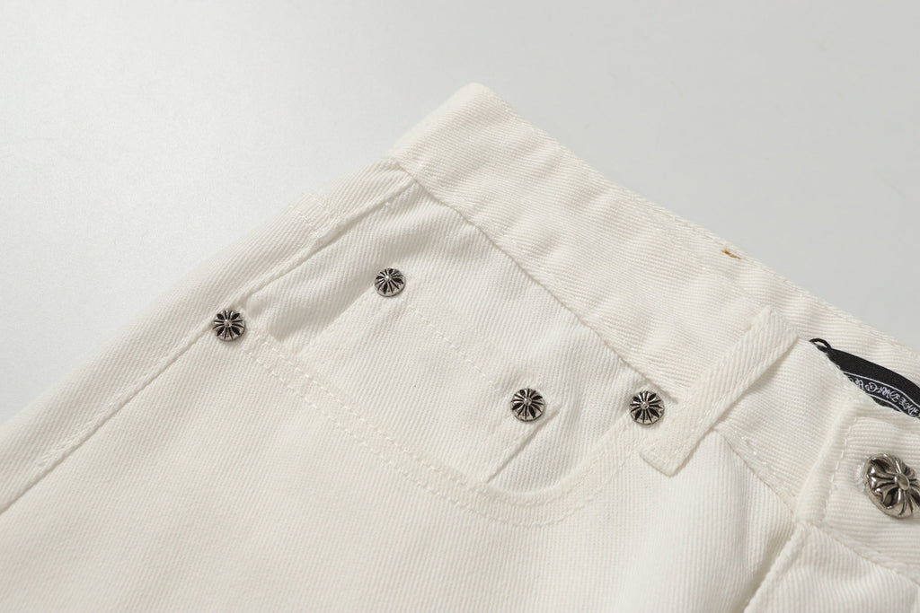 Chrome Hearts' classic white denim jeans with a colored leather cross wash.