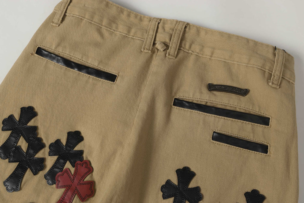 Chrome Hearts khaki straight-leg pants with colorful leather cross patch