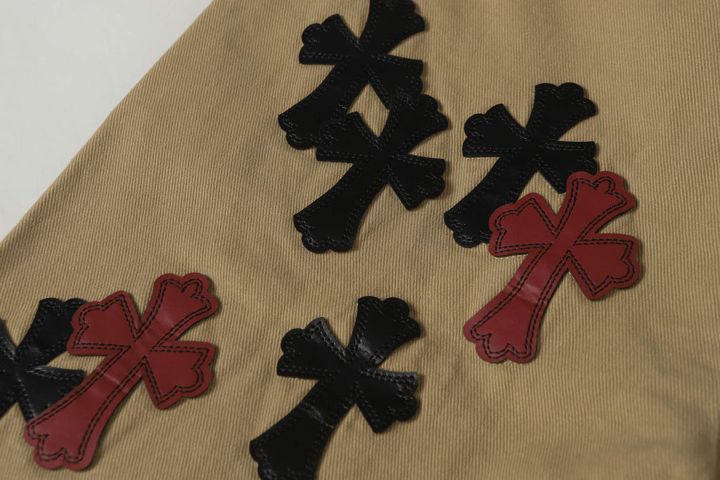 Chrome Hearts khaki straight-leg pants with colorful leather cross patch