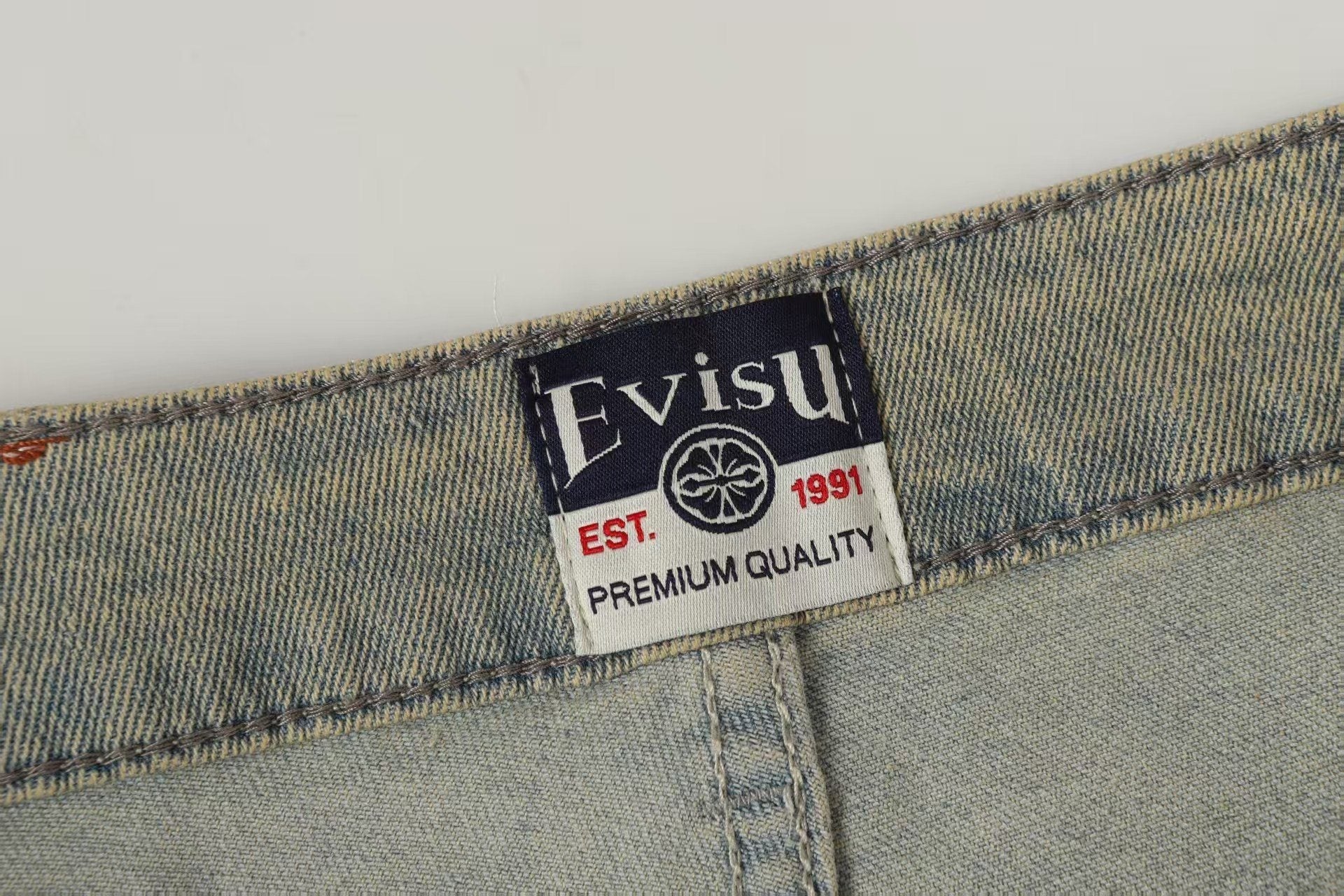Evisu Men's x Loewe Anagram Embroidered Jeans – Light Wash Baggy Denim