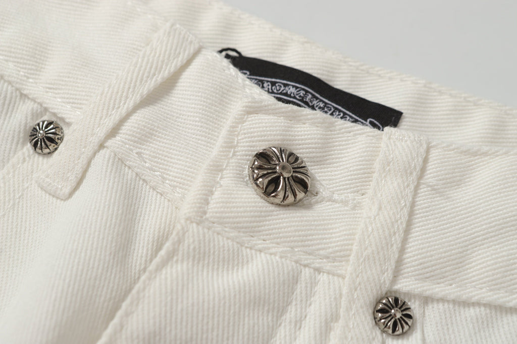 Chrome Hearts' classic white denim jeans with a colored leather cross wash.
