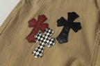Chrome Hearts khaki straight-leg pants with colorful leather cross patch