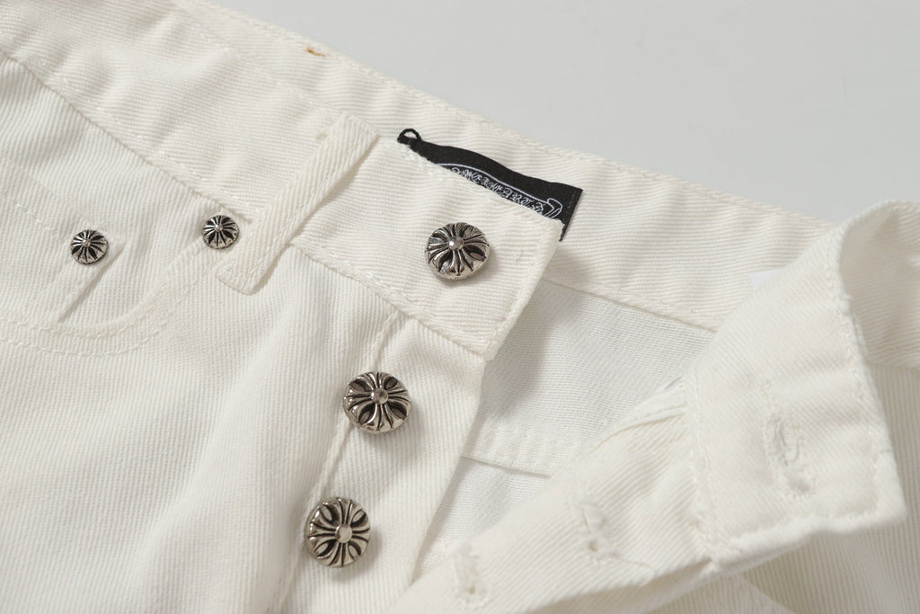Chrome Hearts' classic white denim jeans with a colored leather cross wash.
