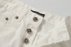 Chrome Hearts' classic white denim jeans with a colored leather cross wash.