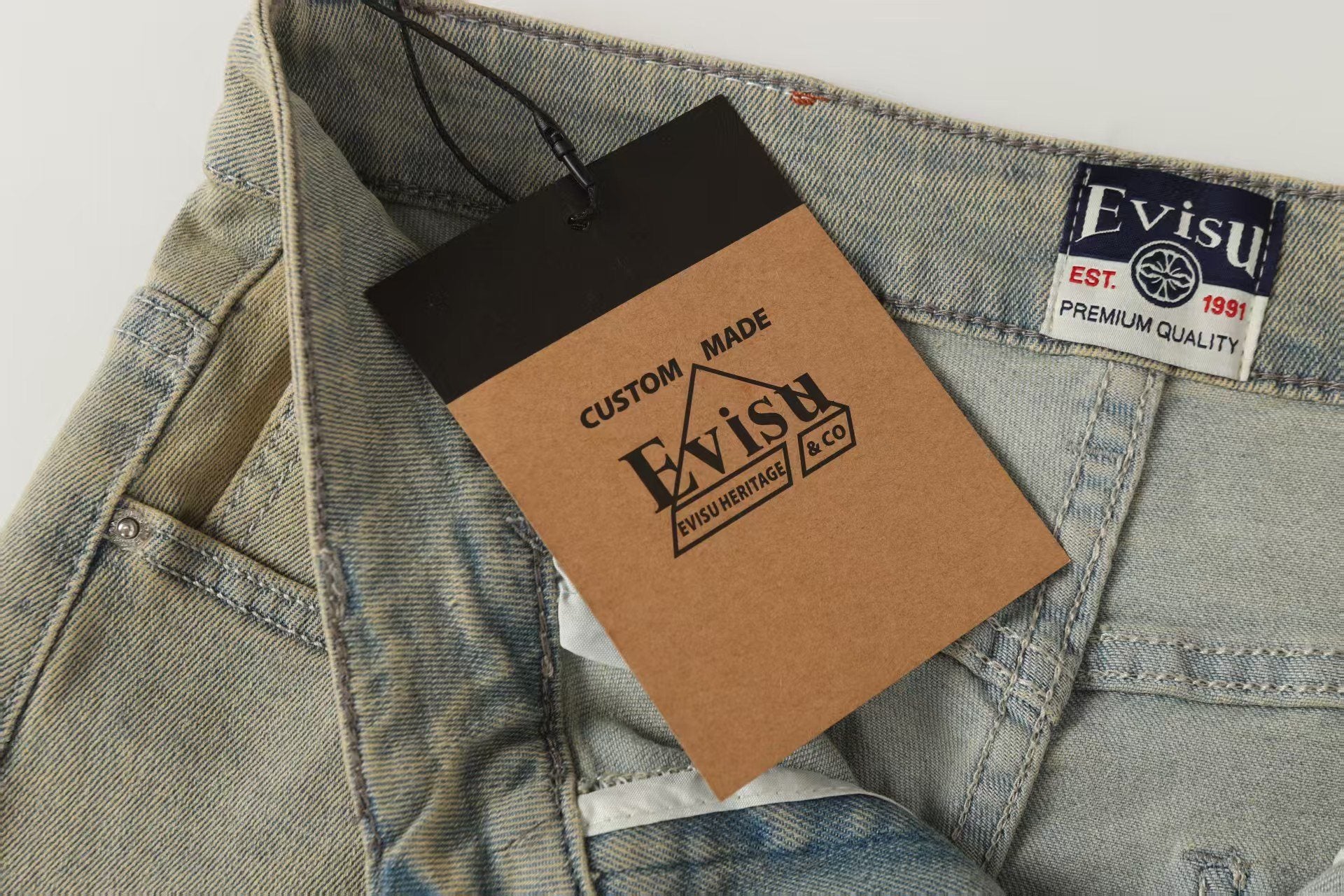 Evisu Men's x Loewe Anagram Embroidered Jeans – Light Wash Baggy Denim