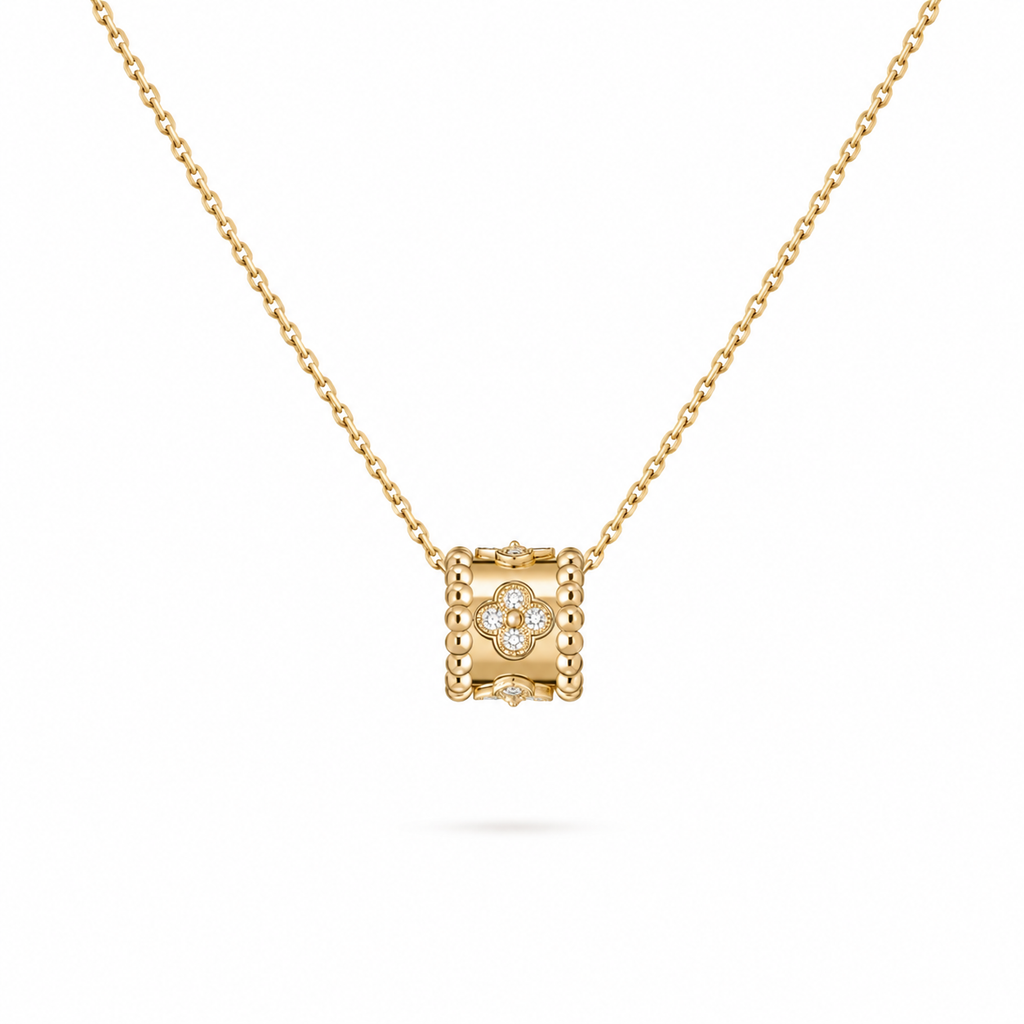 Van Cleef & Arpels Perlée collection clover motif pendant
