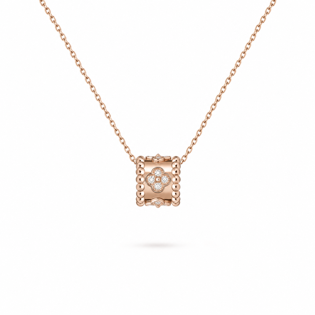 Van Cleef & Arpels Perlée collection clover motif pendant