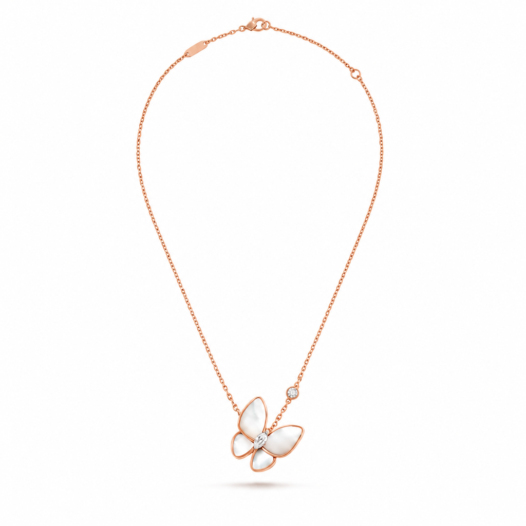 Van Cleef & Arpels Two Butterfly necklace featuring white mother-of-pearl and diamonds.