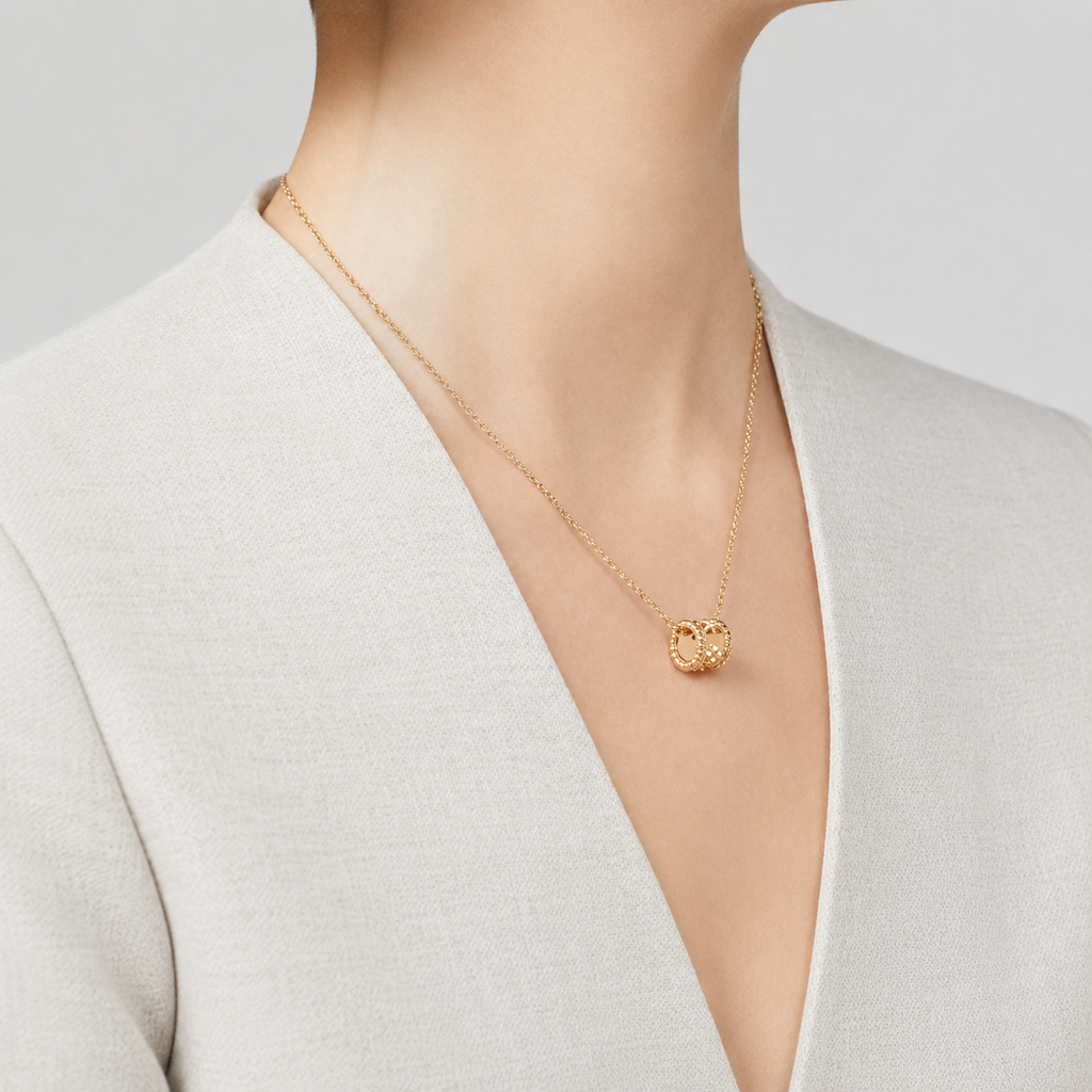 Van Cleef & Arpels Perlée collection clover motif pendant